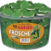 Large clear tub filled with green gummy frogs