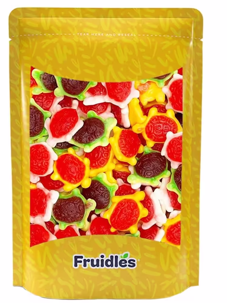A colorful pack of Fruidles Turtles Gummi Candy featuring multicolored fruit-flavored gummy turtles, presented in a resealable bag with vibrant packaging, showcasing the delicious and chewy candy inside.
