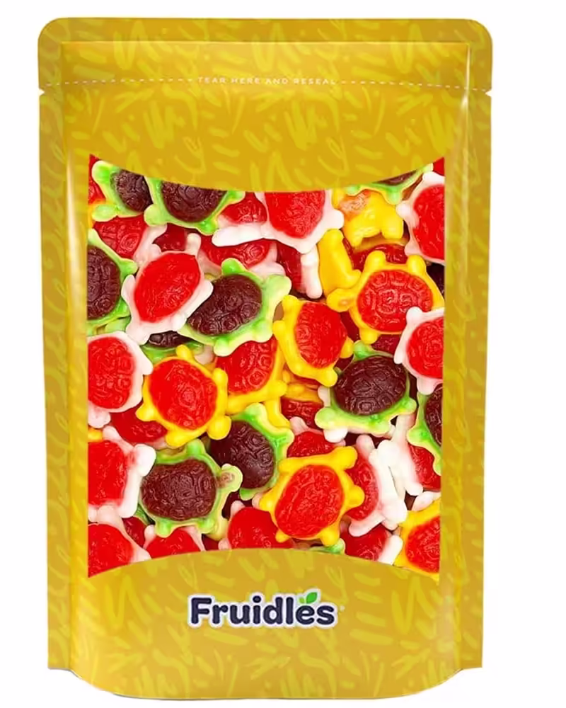A colorful pack of Fruidles Turtles Gummi Candy featuring multicolored fruit-flavored gummy turtles, presented in a resealable bag with vibrant packaging, showcasing the delicious and chewy candy inside.